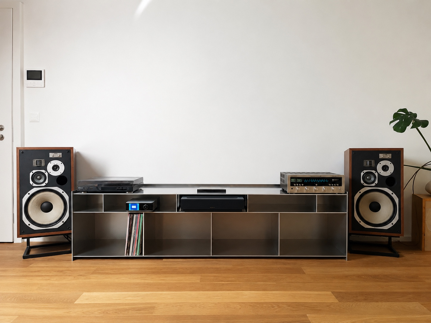 Sideboard 01 in a living room, with a projector, records, turntable and amplifier integrated into its steel shelving